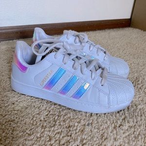 Iridescent Adidas Superstar shoes